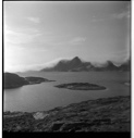 Image of Scenic Greenland with fog bank beyond near mountains