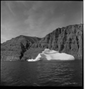 Image of Iceberg by mountain
