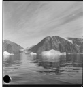 Image of Mountains, small icebergs, clouds