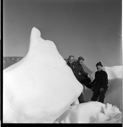 Image of Iceberg frolics; Bertie, Miriam and Rutherford Platt on small iceberg