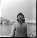Image of Pond Inlet man with pipe