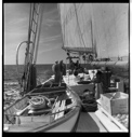 Image of Deck view looking toward wheel and crew