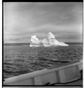 Image of First iceberg, seen over rail