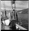 Image of Rutherford Platt standing on deck with TL camera