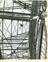 Image of Man climbing in antenna superstructure