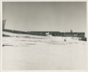 Image of building in snow, antenna beyond Thule AFB