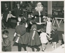 Image of Santa Claus with children and fathers, Thule AFB
