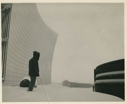 Image of Man standing outside building