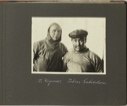 Image of A. Wegener, Tobias Gabrielsen [Two men, Wegener in hooded rain jacket, Gabrielsen in anorak and visored cap]