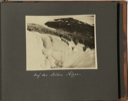 Image of Auf den steilen Rippe [On the steep rib: nine men climbing up glacier, carrying large loads on their backs]