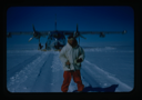 Image of Man in front of plane.