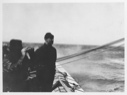 Image of [MacMillan on the Bowdoin, looking out]