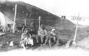 Image of Eskimo [Inuit] family - trout drying