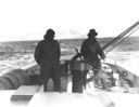 Image of Homeward bound off Labrador, Jot and Abie on quarter deck of Bowdoin