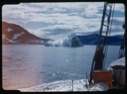 Image of Iceberg and clouds through rigging