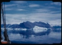 Image of Iceberg through rigging at fiord