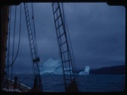 Image of Iceberg through rigging; angry sky