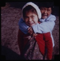 Image of Two Eskimo [Inuit] girls--piggyback