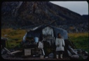 Image of Eskimo [Inuk] grandmother by tent