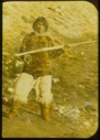 Image of Eskimo [Inuk] man with narwhal tooth
