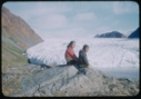 Image of Young women and boy sitting by Brother John's Glacier