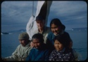 Image of Ootaq, Harrigan [Inukitooq], Donald MacMillan, and two woman from NP Expedition