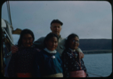 Image of Donald MacMillan and three Eskimo women from NP Expedition