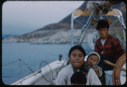 Image of Eskimo [Inuit] family aboard