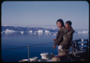 Image of Eskimo [Inuit] mother and child aboard
