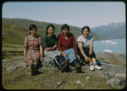 Image of Four Eskimo [Inuit] women sitting, in western dress