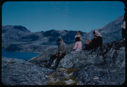Image of Group of Eskimos [Inuit] on rocks