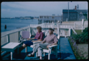 Image of Miriam and Donald MacMillan seated on their deck