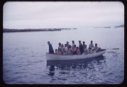 Image of Eskimos [Inuit] in open boat
