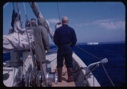 Image of Barney (Byron?) Turner looking at first iceberg