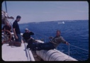 Image of Crewmen relaxing on deck
