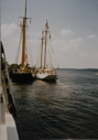 Image of View of the Ernestina and Bowdoin from astern, taken on board the Sherman L. Zwicker