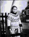 Image of Eskimo [Inuk] woman in dress-costume
