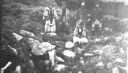 Image of 5 Inuit in sealskin clothing